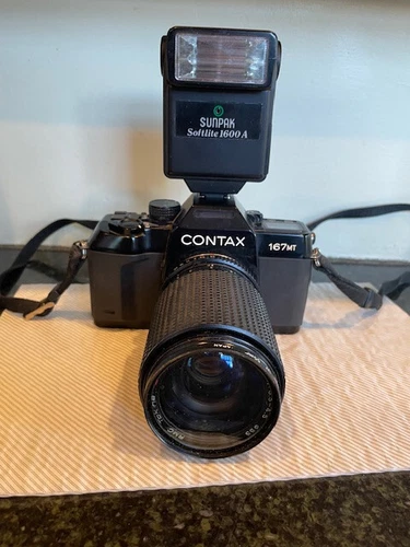 Contax 167MT SLR Camera Complete with 35-135mm lens, UV cover, flash attachment
