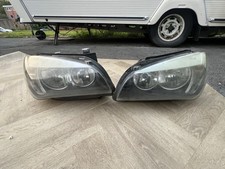 2010 BMW X1 E84 FRONT RIGHT DRIVER SIDE HEADLIGHT RHD GENUINE & BRACKET