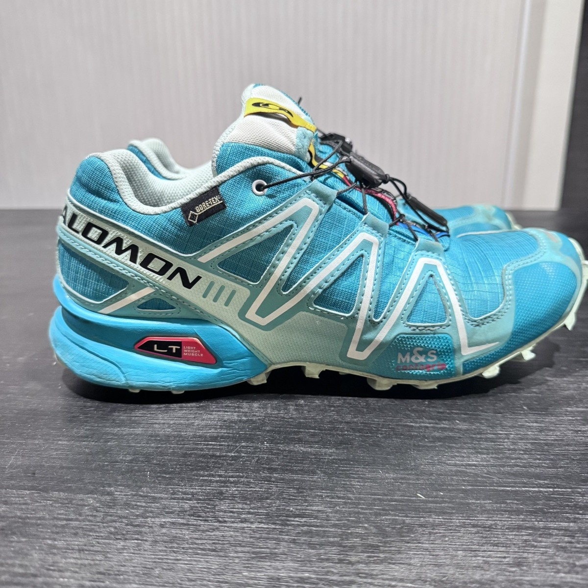 Salomon Speedcross 3 women's trail running shoes in a turquoise