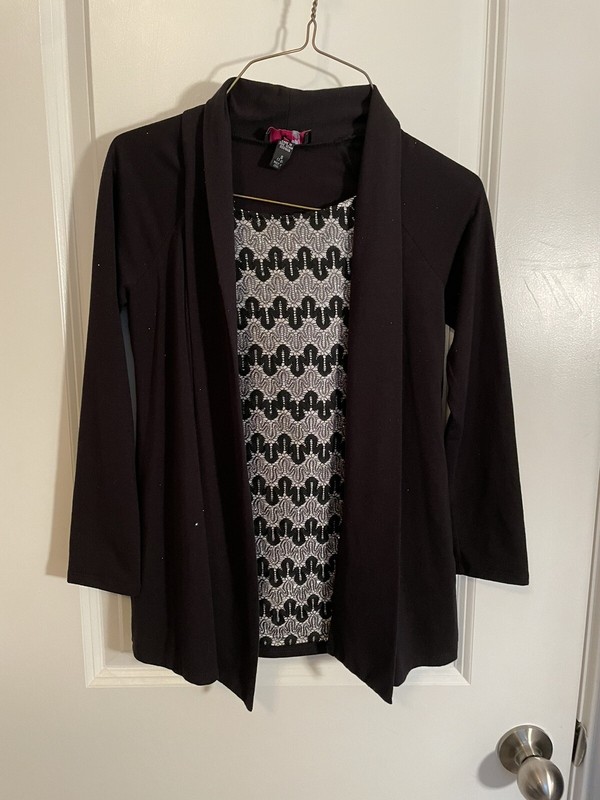 Girls size small 7-8 shirt. black has sparkles 