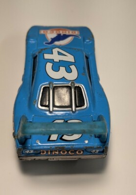 DISNEY PIXAR CARS #43 1970 PLYMOUTH SUPERBIRD DIECAST Dinoco