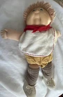 vintage 1984 Cabbage Patch doll with two bibs shoes and outfit