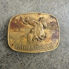 Vintage 1975 Smith Wesson "The Hostiles" Cowboy Riding Horse Brass Belt Buckle