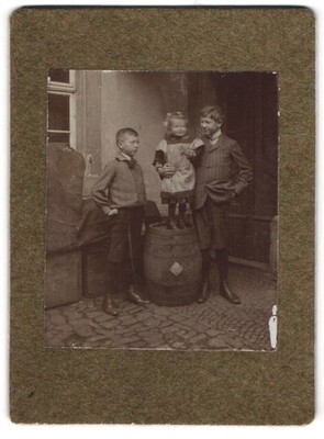 Photograph Two Boys With Laughing Little Girl In A Bin 
