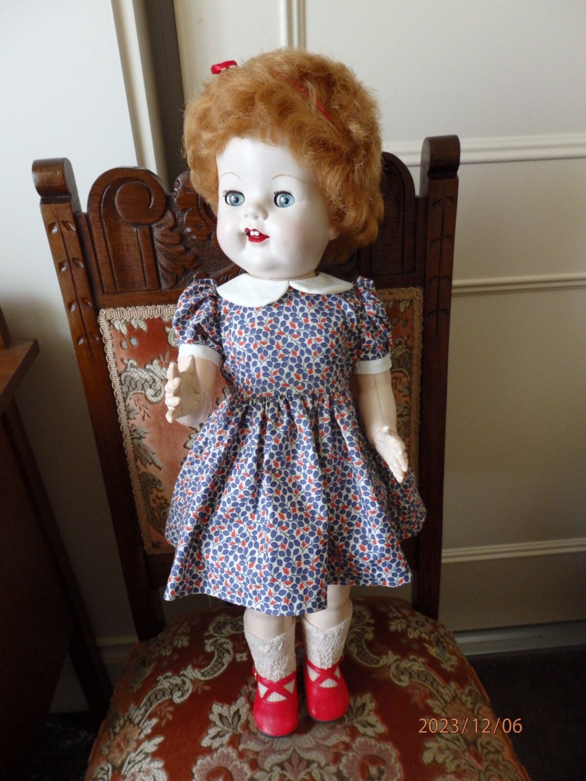 1950s hard plastic doll Made in England, 22inches (56cm) height red