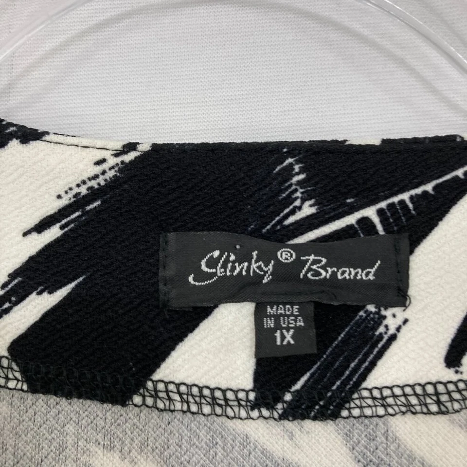 Chaqueta Slinky Marca Talla 1X Negra Blanca Abstracta Elastizada Bolsillos Abierta Manga 3/4 Foto 2 de 4