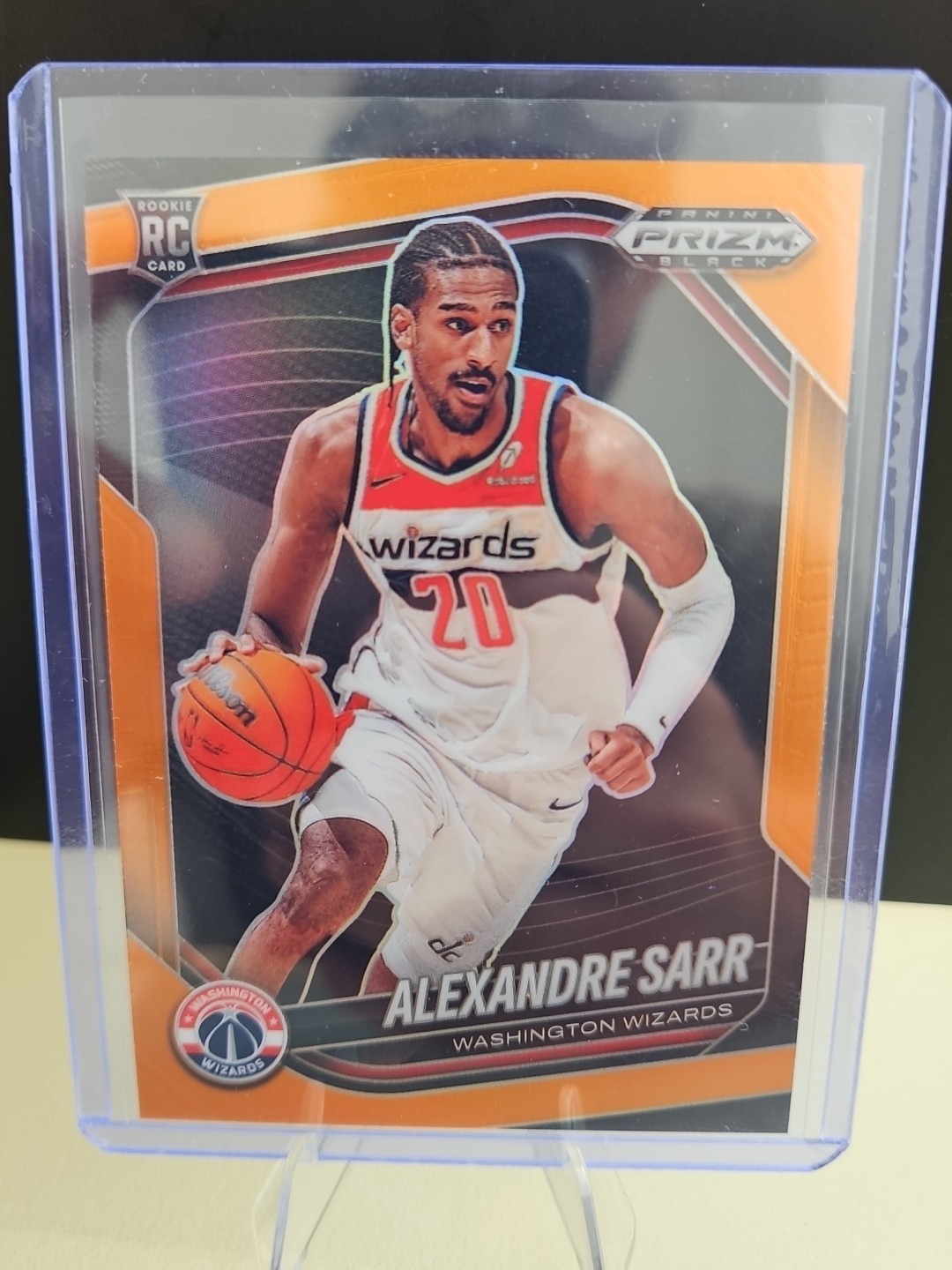 2024-25 Panini Prizm Black Alexandre Sarr Orange RC Rookie 07/49 #46 Wizards