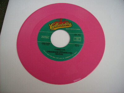 CREEDENCE CLEARWATER REVIVAL - COMMOTION - 7'' ORANGE VINYL NEU