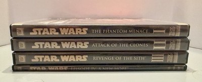 Star Wars 4 film DVD Collection 8 discs total Epsisode 1-4.  Used Excellent