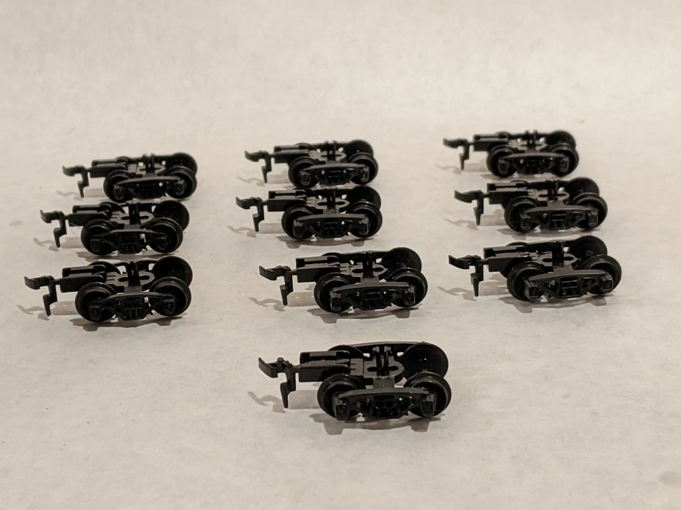 Lote 10 camiones TYCO HO bogies con acopladores, piezas de repuesto de vagones de tren de carga Foto 2 de 4