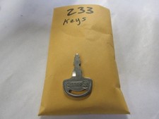 Vintage Suzuki  OEM Factory Pre Cut Motorcycle Key # 233