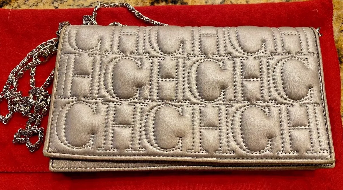 Carolina herrera hotsell clutch
