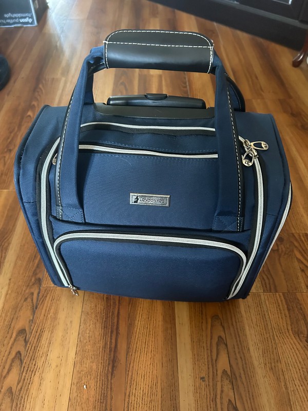 London Fog Carry On Underseat Travel bag Wheels and extending handle BLUE