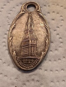 VTG SILVER TONE "THE TRAVELERS " INSURANCE CO. HARTFORD CT. TAG