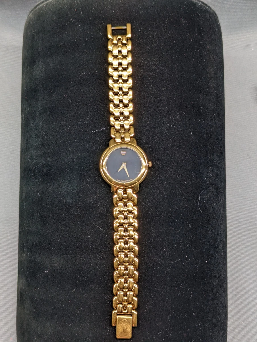 Movado gold watch black sales face