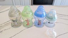 3 Tommee Tippee 9 oz Bottles and 1 Tommee Tippee 5 oz Bottle 3 Size 1 Nipples/1