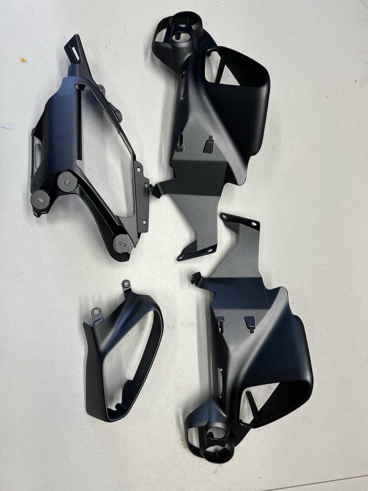 Genuine Ferrari 488 dashboard trim set. 4 piece air vent trim in magnesium. OEM