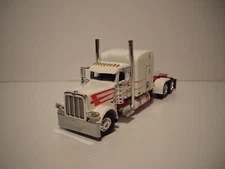 DCP FIRST GEAR 1/64 DAWES RED AND WHITE PETERBILT 389 WITH 63" SLEEPER