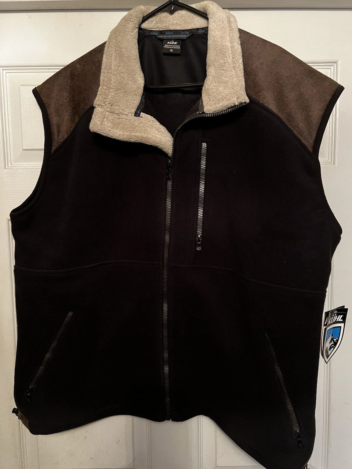 Kuhl Vest Mens size Medium Black With Brown Accent On Shoulders.
