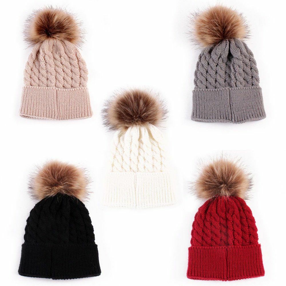 multi coloured fur bobble hat
