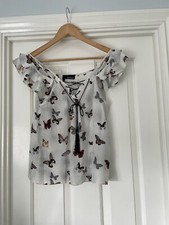 Image of the Kooples Silk butterfly print aummer top should detail size S