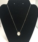 Sterling Chain With Oval Mother of Pearl Pendant Accented With Rhinestones