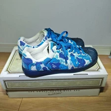 Rare KAWS x BAPE sneakers, blue, size 27.5cm, limited edition.