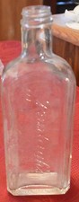 VINTAGE RAWLEIGH'S CLEAR GLASS MEDICINE BOTTLE, TRADEMARK, MADE IN THE USA