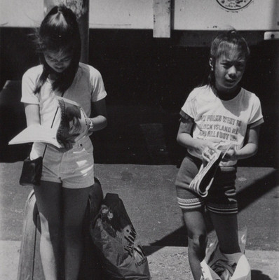 TWO GIRLS READING WITH SHOPPING BAGS NYC 1983 Gelatin Silver Photograph