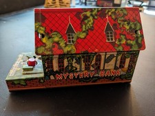 Tin Windup Haunted Mansion Mystery Bank With Creepy Hand and door clicking