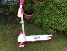 light burst pink and white scooter