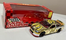 1/24 NASCAR Racing Champions - 94 Bill Elliott McDonald  s Taurus Gold Diecast
