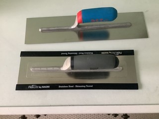 A 16"Plasterers trowel and a 14"Flevlite skimming trowel.