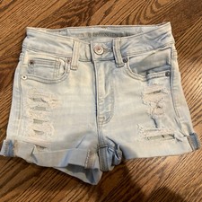 NWOT. American Eagle Hi-Rise Shortie Distressed Light Wash Jean Shorts. Size 00
