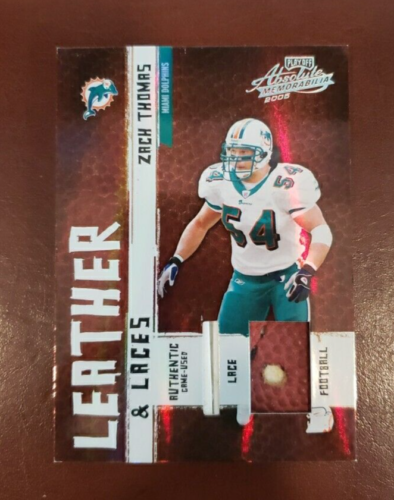 2005 Playoff Absolute Memorabilia cuir et lacets /25 Zach Thomas #LL-21 neuf comme neuf - Photo 1 sur 3