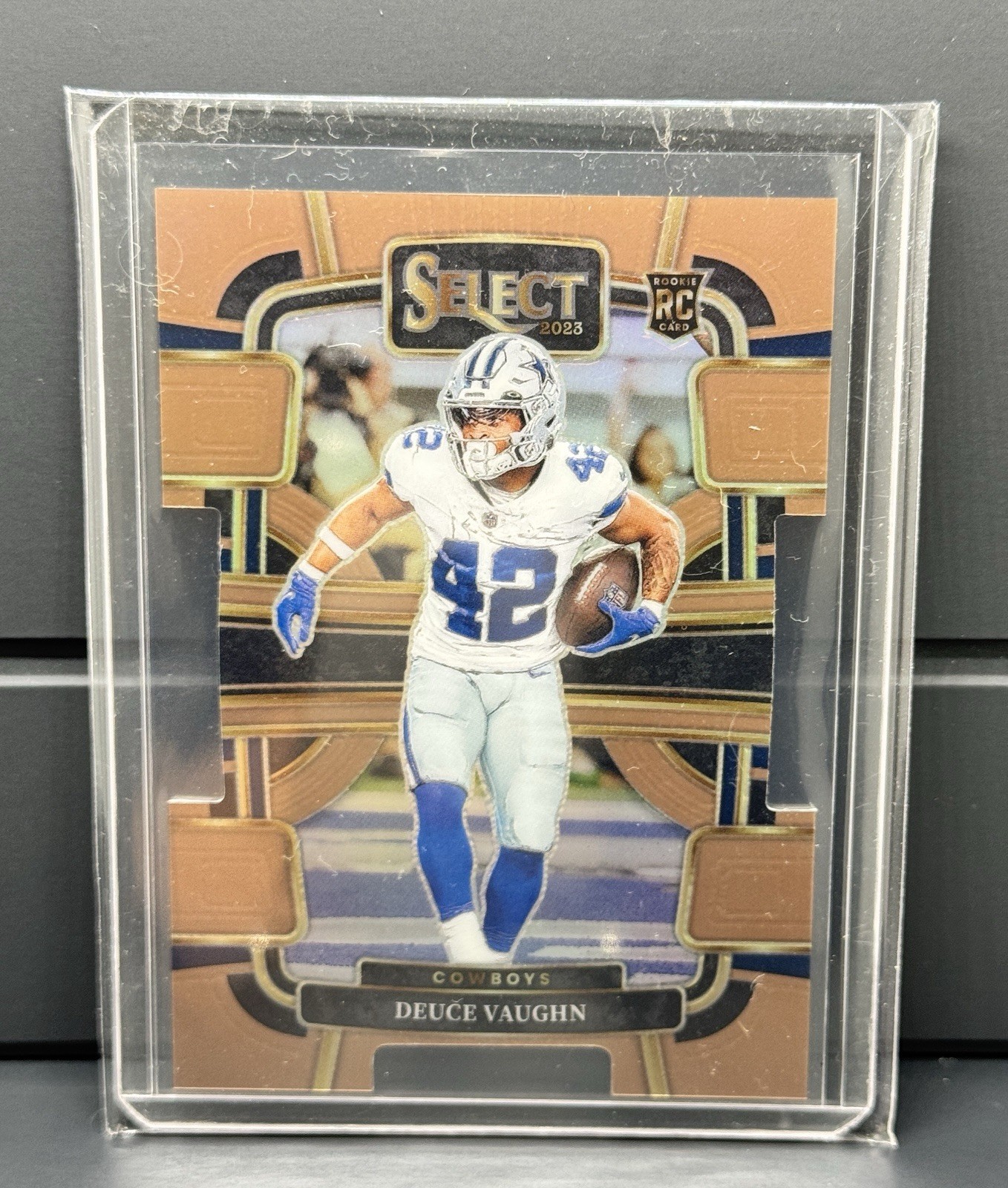 Deuce Vaughn - 2023 Panini Select #28 Copper Prizms Die Cuts #/299