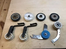 8 Dryer Drum Rollers & Idler Pulleys.  Used