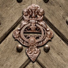 Kołatka do drzwi, anioł, antyczna | żelazo, czerwona (miedź) | wys. 26,0x szer. 18,5 cm