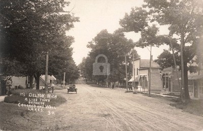 It's Delton, Mich, A Live Town Between Crooked & Wall L MI RPPC Postcard COPY