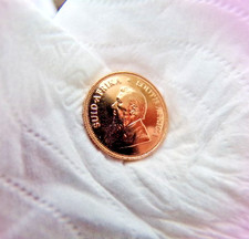 1/10oz Gold Krugerrand. 2012. Delightful coin. Near mint.Possibly a proof. 3.4g  4025.16 per troy oz