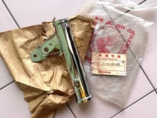 NOS JAPAN HONDA TRAIL SL125 SL125K1 STAY HEADLIGHT LH GENUINE PN 61312-331-000XW