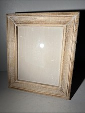 Rustic distressed wood picture frame with farmhouse style finish.