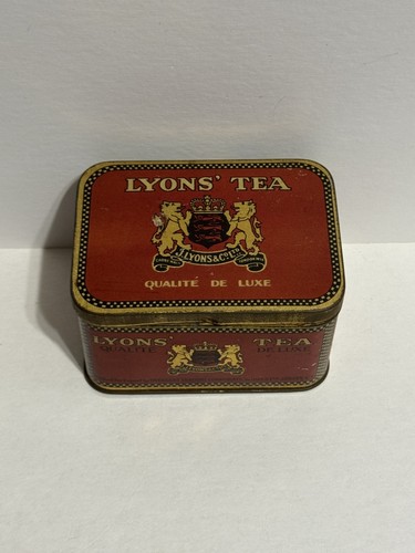 VINTAGE LYONS TEA MADE IN ENGLAND ADVERTISING TIN LIDDED IN USED CONDITION