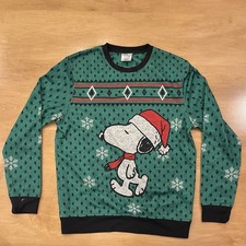 Peanuts holiday sweater featuring Snoopy
