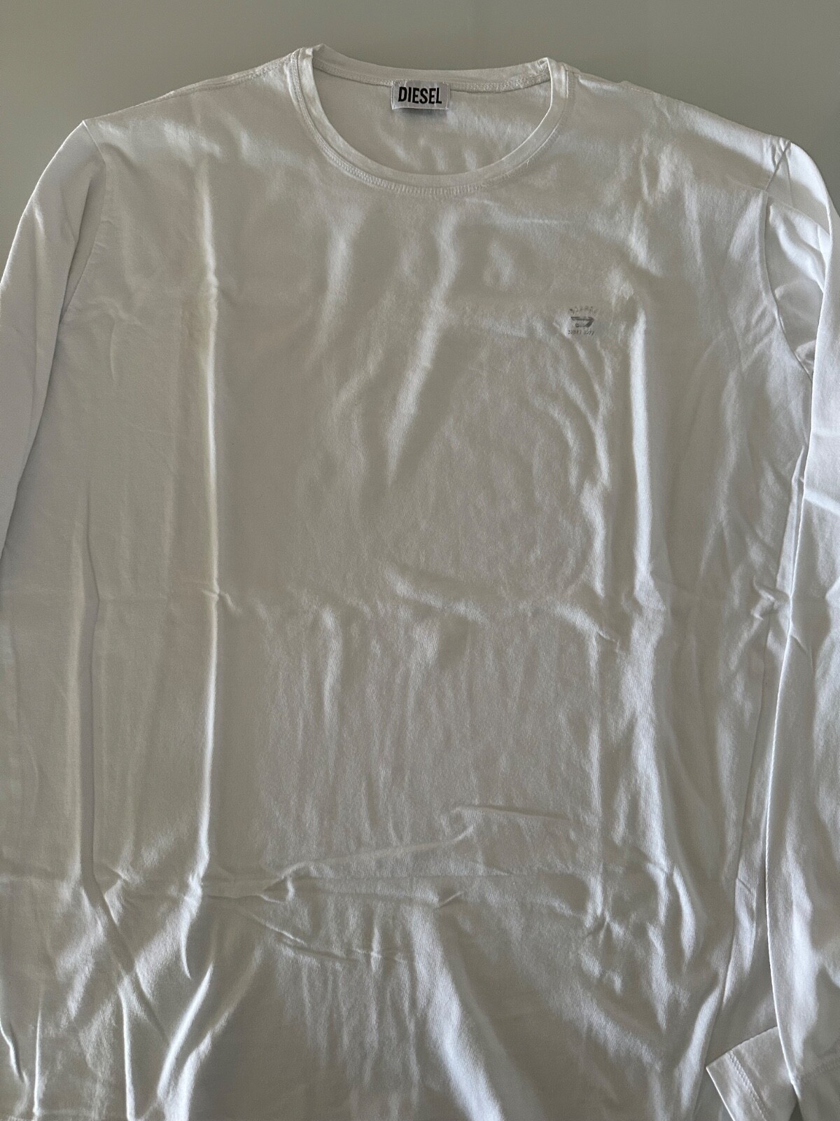 ALTRA MAGLIETTA UOMO DIESEL MANICA LUNGA COLORE BIANCO SPEDIZIONE VELOCE