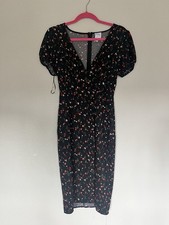 Polly dress, Black With Flowers, Size Four, Form Fitting, Cute