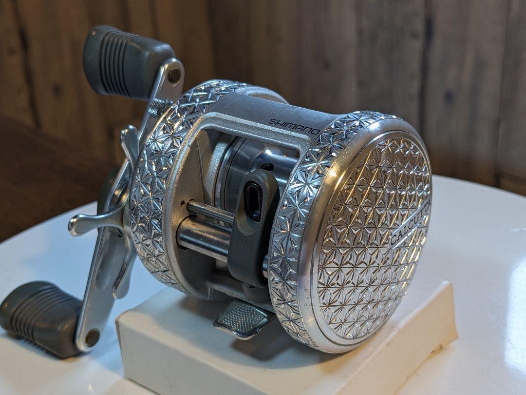 Shimano Calcutta 200 彫金 Engraving custom Shimano Calcutta 200 Engraving Custom Bait Reel Fishing