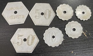 SCHOKOLADE MENIER NOISIEL SET MIT 7 MÜNZEN AUS ALU 50 C 10 C 5 C.