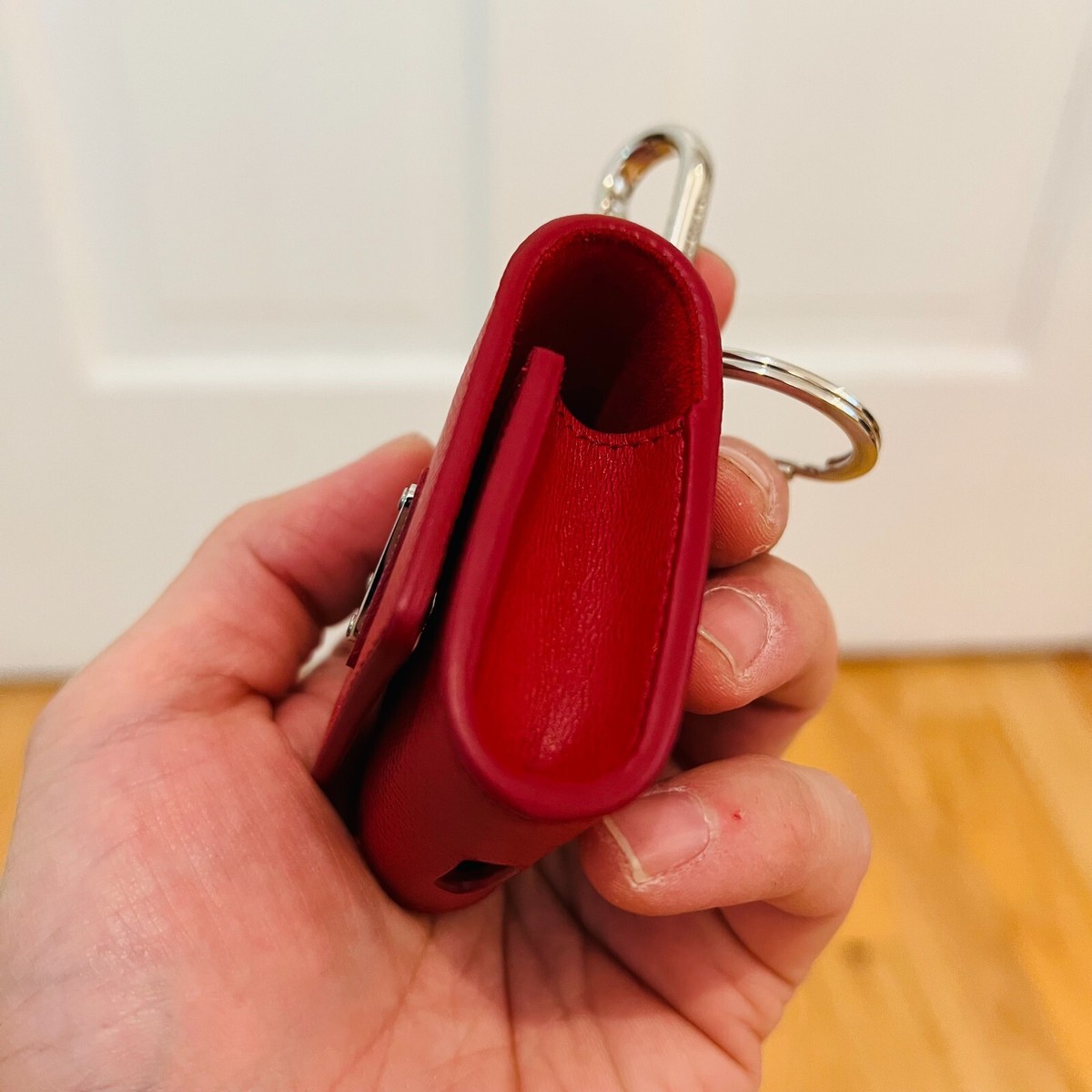 Brand new item PRADA AirPods case, with triangular logo and Brand new item PRADA AirPods case, with triangular logo and