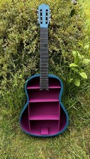Handcrafted guitar shelf made out of a recycled guitar